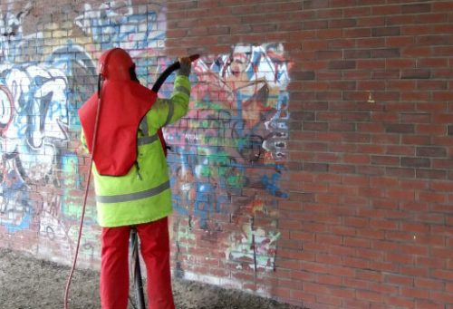 Graffiti removal done in NYC on a brick wall by our NYCryoTech crew